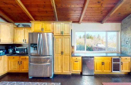 Freestone House | Serene wine country retreat with ample outdoor living, gas grill, & fireplace