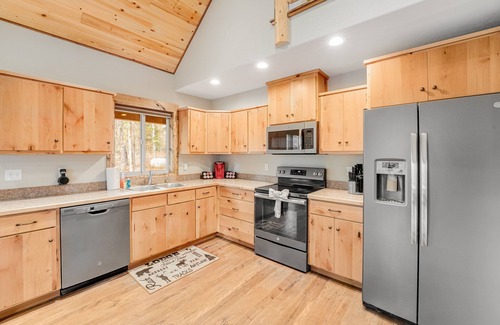 Bigfork Cabin | Serene woodland cabin with firepit, porches & fireplace, near lakes & Glacier