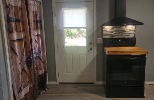 Cushing House | Serenity's Sanctuary in this quiet, peaceful 2 bdr 1 bath bungalow. Pet friendly