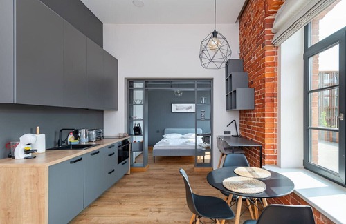 Kaunas Apartment | Shanti barracks apartment 3 by Polo Apartments