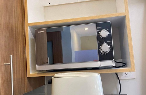 Barangay 76 Condo | Shore 3 Residences Authentic Japanese-Style Bedroom with Pool View - MOA Complex
