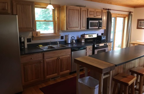 Cheboygan County Cabin | Sidell's Sturgeon River Log Cabin - Bonfire Pit, WiFi, Biking Trails, Rafting