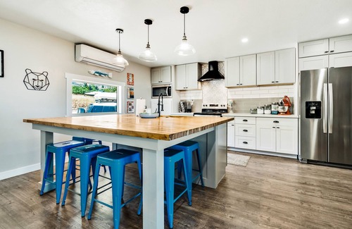 Fish Haven House | Single-level, lakefront getaway with mini-bar, furnished deck & mountain views