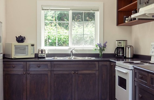 Regional District of Nanaimo House | Sit Back & Watch Waves at Rathtrevor Cottage