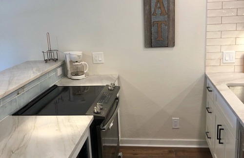 North Park City Condo | Ski In/Ski Out Condo. Overlooking Ice skating rink. Steps to Slopes!