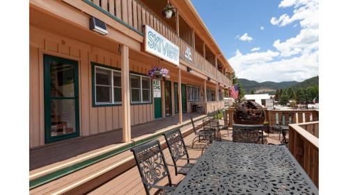 Red River Apartment | Ski View 06 - Ski View 04 Columbine - On Main Street - WiFi - Cable - Fireplace - Trailer Parking In Back - Patio with Gas Gril