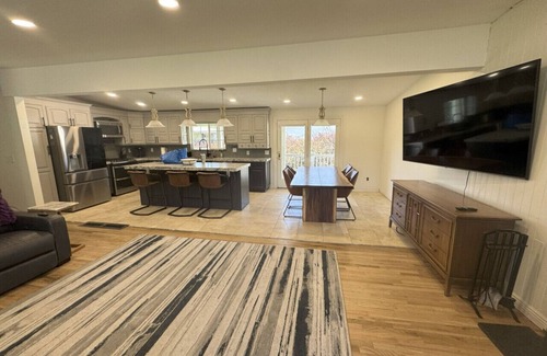 Holladay House | Skiing, Stocked Kitchen, 80" TV, Backyard, W/D