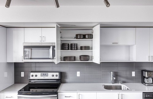 Wilburton Apartment | Sleek Bellevue 1BR w/BBQ, Gym, W/D, near Spring District, by Blueground