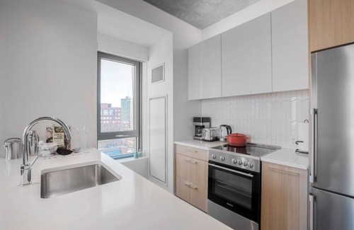 MIT Apartment | Sleek Kendall Sq 2BR, Gym, Doorman, walk to MIT by Blueground