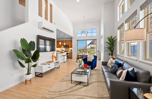 Makaha Valley House | Sleeps 16, 2 Homes | Ocean Views, Shared Pool + Gym, Near the Beach | AvantStay