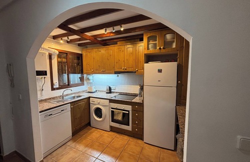 Roda Apartment | Sleeps up to 6, shared pool, parking with Aircon