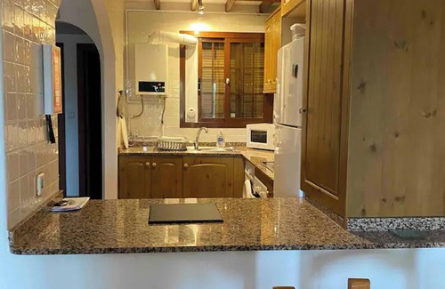 Roda Apartment | Sleeps up to 6, shared pool, parking with Aircon