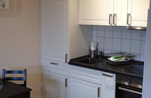 Dornum Apartment | Small apartment in Dornumersiel with glazed balcony House Spieckeroog