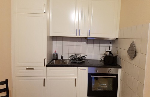 Dornum Apartment | Small apartment in Dornumersiel with glazed balcony House Spieckeroog