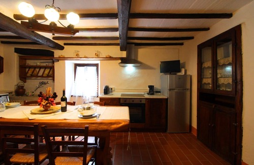 Pieve di Chio Apartment | Small house in an old hamlet with two double rooms, panoramic swimming pool in shared use. Quiet and