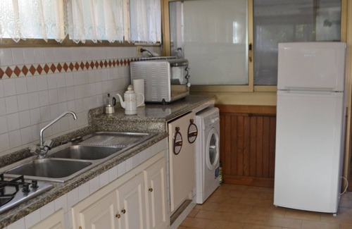 Ex Campo d'Aviazione Villa | Small house with fir garden