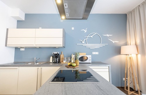 Bad Zwischenahn Apartment | SmartFewo: Nebelgruß | lake terrace | sauna | park