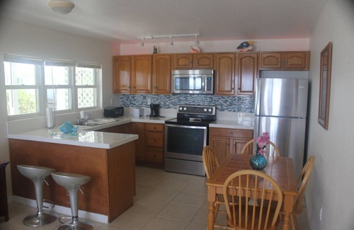 West End Condo | Snorkelers & Divers Paradise-Cayman Brac-2 Bedroom On Beach With Deck