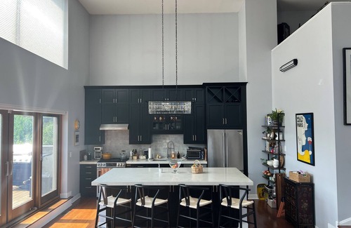 Lakeview Condo | Soaring ceilings, city views and private rooftop deck!