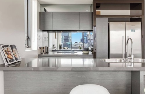 Docklands Apartment | Soaring Heights Vibrant Docklands Living with Pool