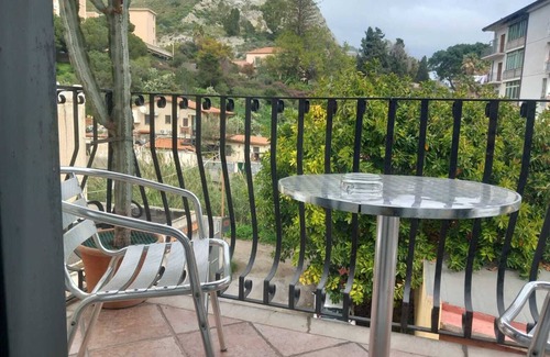 Villagonia Apartment | Sole Mare Giardini Naxos Room 'Girasole' with Balcony, Wi-Fi and Air Conditioning