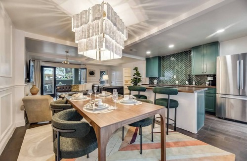 Old East Dallas Condo | Sophisticated 2-Bed, 1.5-Bath furnished condo in central Dallas with a private patio, serene garden views, and exclusive access to an award-winning courtyard equipped with premium wellness products and relaxing lounge areas.