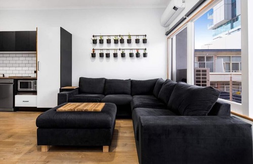 Adelaide Central Business District Apartment | South Terrace · Modern Oasis: Off-Street Parking, Kitchen, WiFi