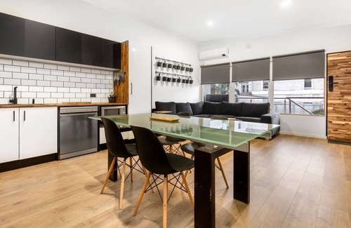 Adelaide Central Business District Apartment | South Terrace · Modern Oasis: Off-Street Parking, Kitchen, WiFi