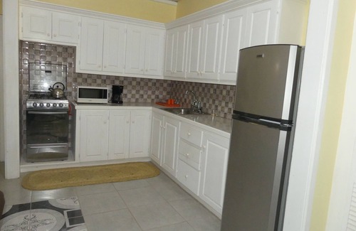 Laborie Apartment | Southern Comfort at its best! Family suite overlooking quaint village street.