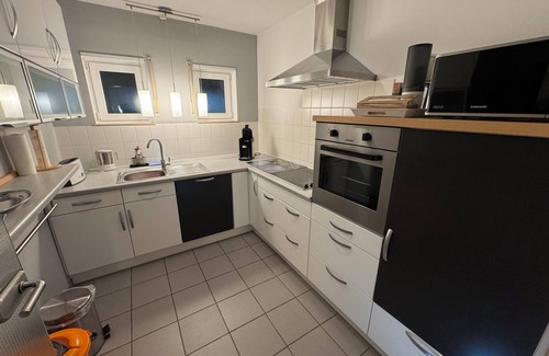 Herxheim Apartment | Spacious vacation apartment with a beautiful covered terrace in a huge garden.