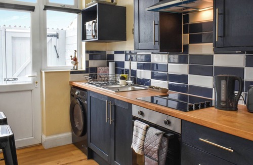 Heysham Apartment | Spacious, stylish coastal duplex with sea-view decking and balcony.