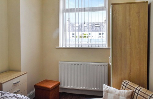 Heysham Apartment | Spacious, stylish coastal duplex with sea-view decking and balcony.