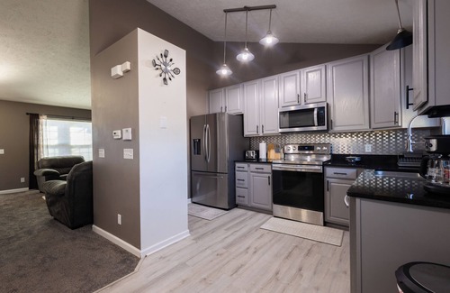 Chalco House | Spacious 4 bedroom house with AC, WiFi in, 2 living rooms, fenced, 2 car garage.