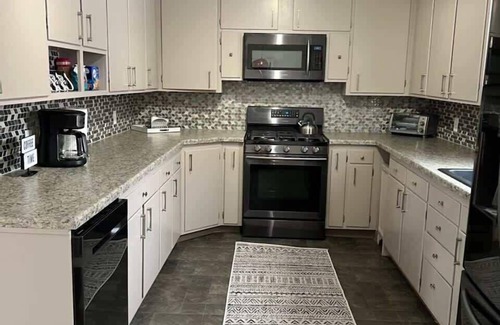 Ironwood House | Spacious 4 BR 2BA Home with Bar and Fenced Yard