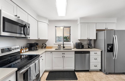 Aurora Hills Apartment | Spacious 4BR Home w/Game Room, Fire Pit, & Fully Fenced Yard