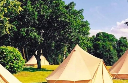 Danderhall RV Rental | Spacious Bell Tent Nestled in Our Orchard Field at Edinburgh Festival Glamping!