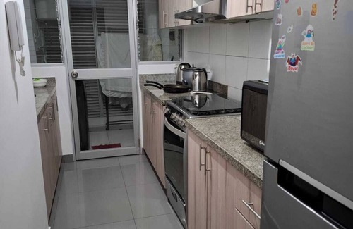 Santa Beatriz Apartment | Spacious, close to parque de las aguas and national stadium, with garage.