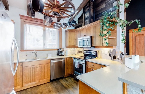 Big White Ski Resort House | Spacious condo with private hot tub, ski in/out access and mountain views
