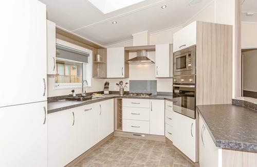 Aysgarth Ski Chalet | Spacious contemporary lodge with one double with en suite shower and one twin.