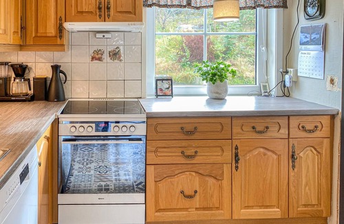 Sveio House | Spacious cottage in a rural location with great terrace and beautiful fjord view.