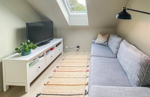 Sveio House | Spacious cottage in a rural location with great terrace and beautiful fjord view.