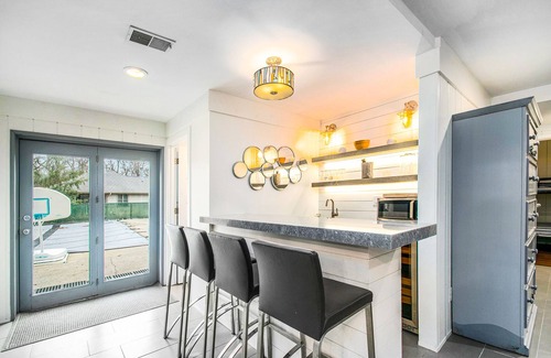 Grand Beach House | Spacious, dog-friendly home with a gas fireplace, pool, hot tub, & golf carts