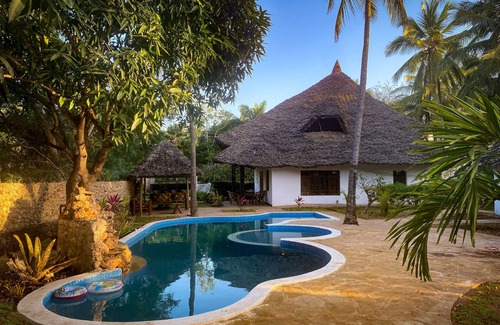 Diani Beach House | Spacious holiday home with private pool and garden.