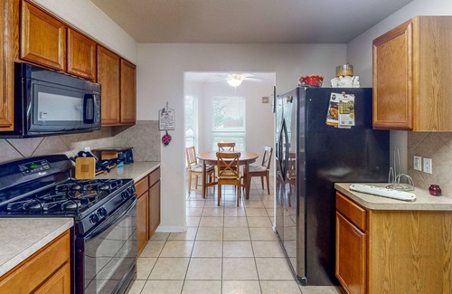 College Park House | Spacious Home on Corner Lot with Gas Fireplace & Big Fenced Yard