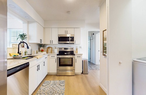 Charlotte Park House | Spacious home with private balcony , washer/dryer, and work space-dog friendly