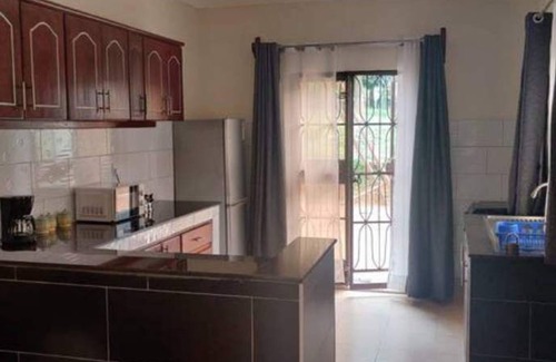 Kampala Apartment | Spacious, luxurious & peaceful 3BR, 3BA near DT large lawn secure free parking.