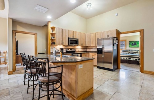 Estes Park Condo | Spacious Luxury Downtown Riverfront Loft Condo. License #6027