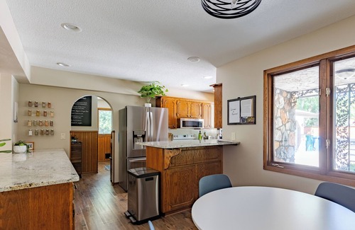 Fridley House | Spacious Mississippi River Retreat-Hot Tub, Massage Chair & Room for 16