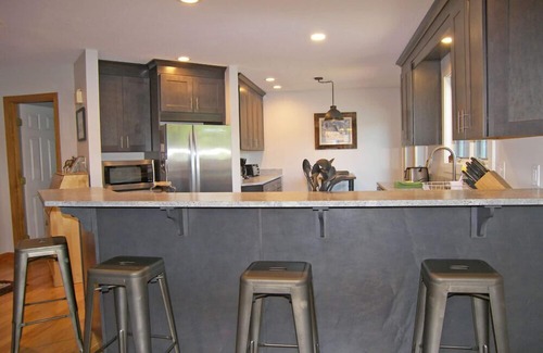 North Woodstock House | Spacious, multi-level, FP, deck, lake view, pool & fitness club. D0307 by LRS