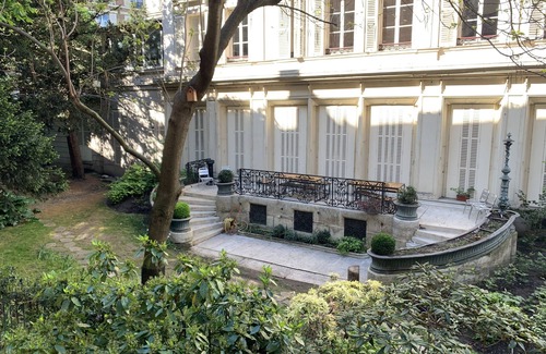 Quartier de Rochechouart Apartment | Spacious Parisian Apartment in Historic building, Private Garden